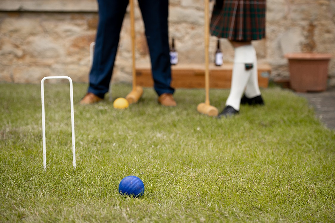 Outside games at Kirknewton House Stables wedding venue